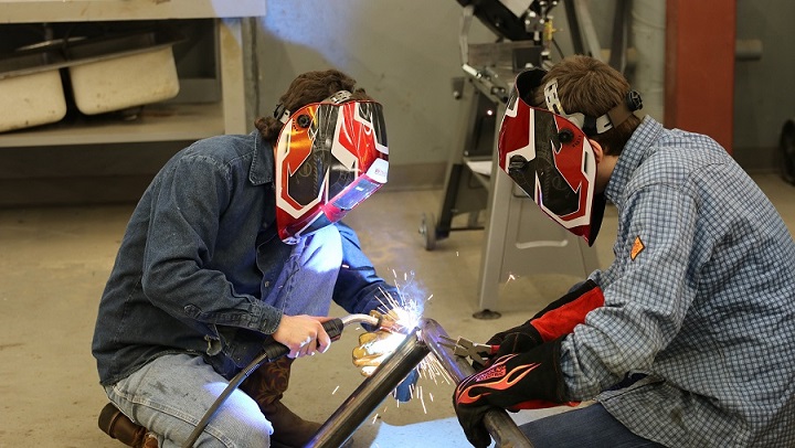 Students welding 