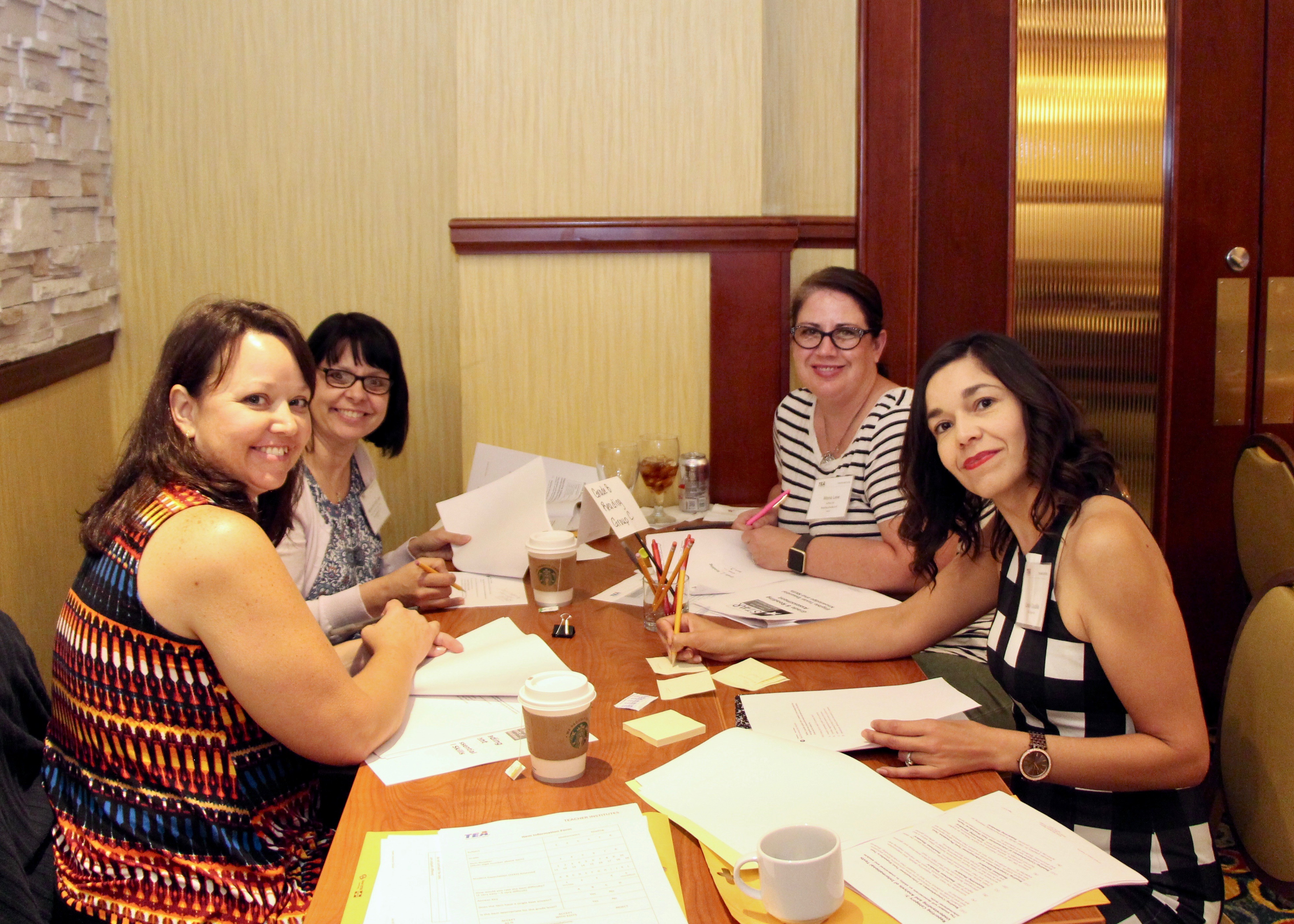 A group of teachers collaborating